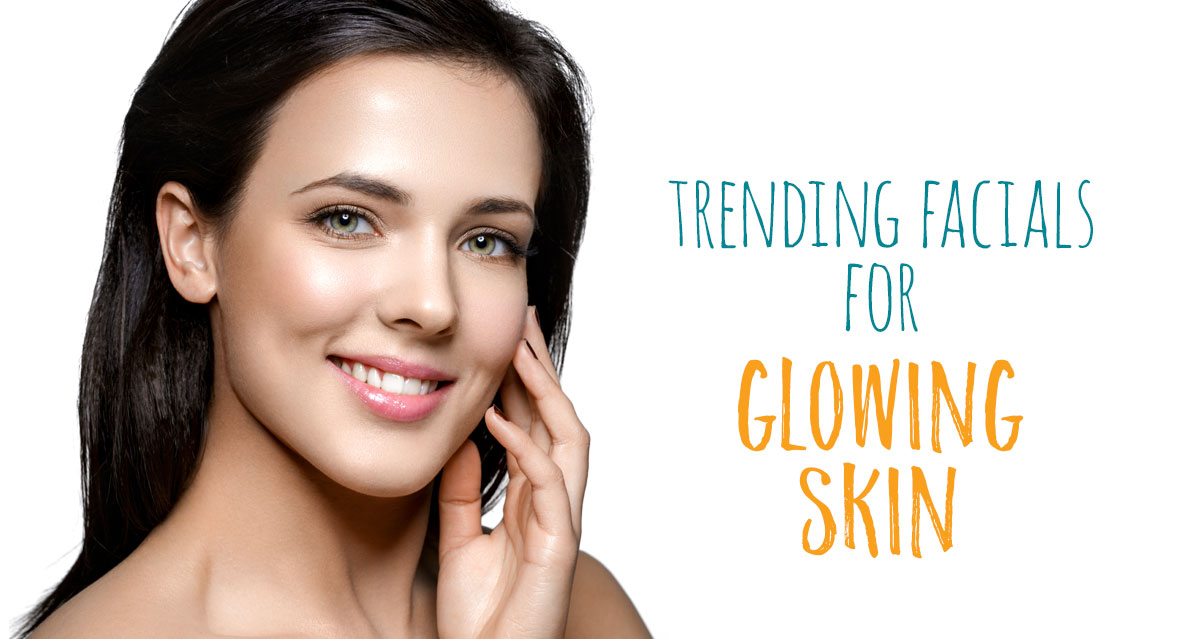 a smiling woman. trending facials for glowing skin.