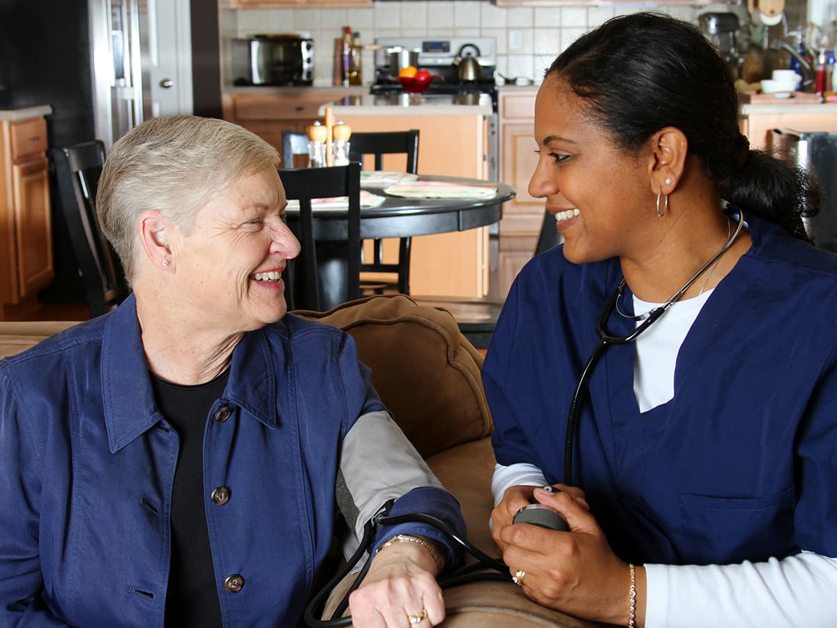 nurse taking blood pressure